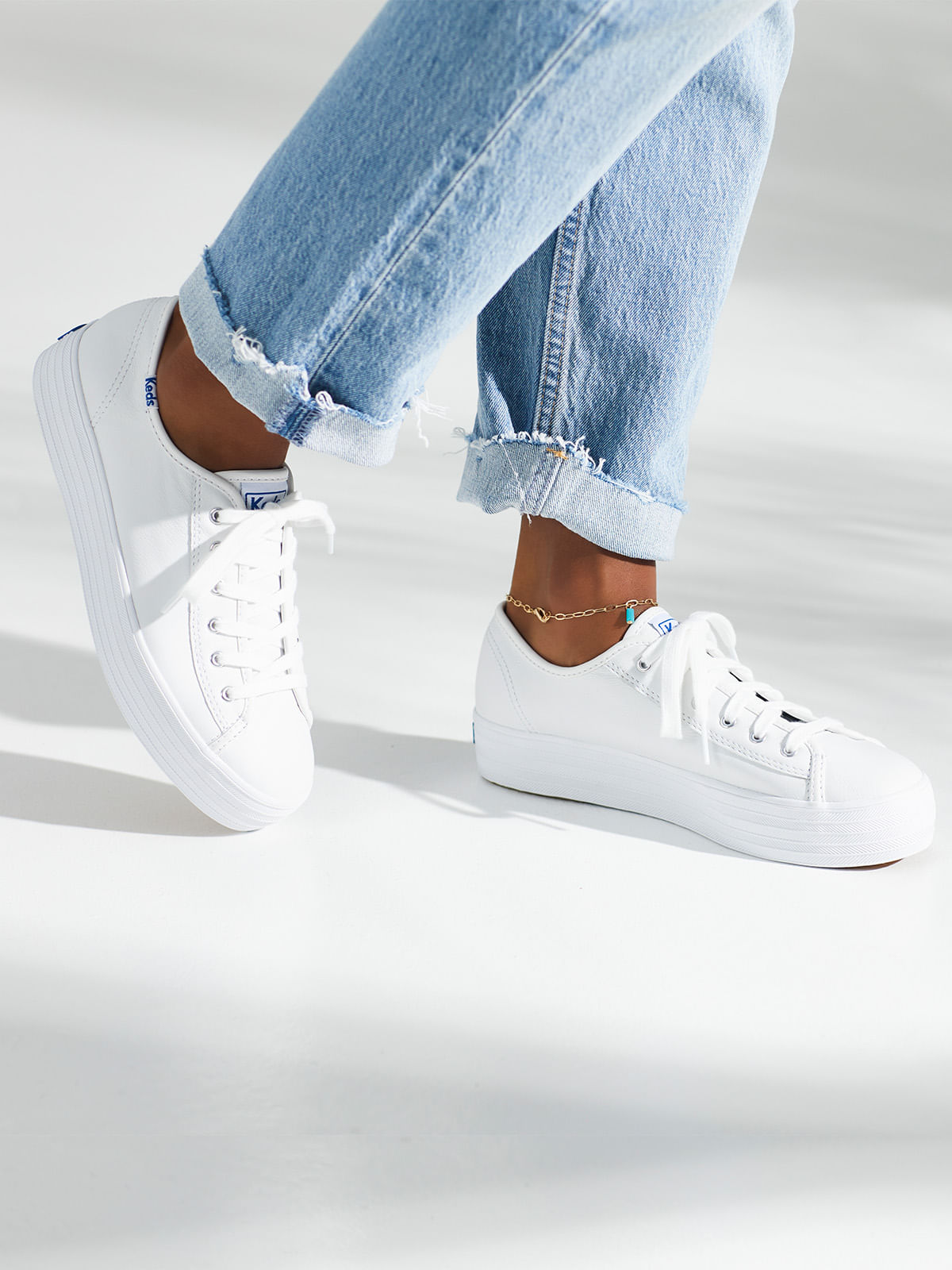 Zapatilla de Mujer con Plataforma Cuero Blanca Triple Kick Leather